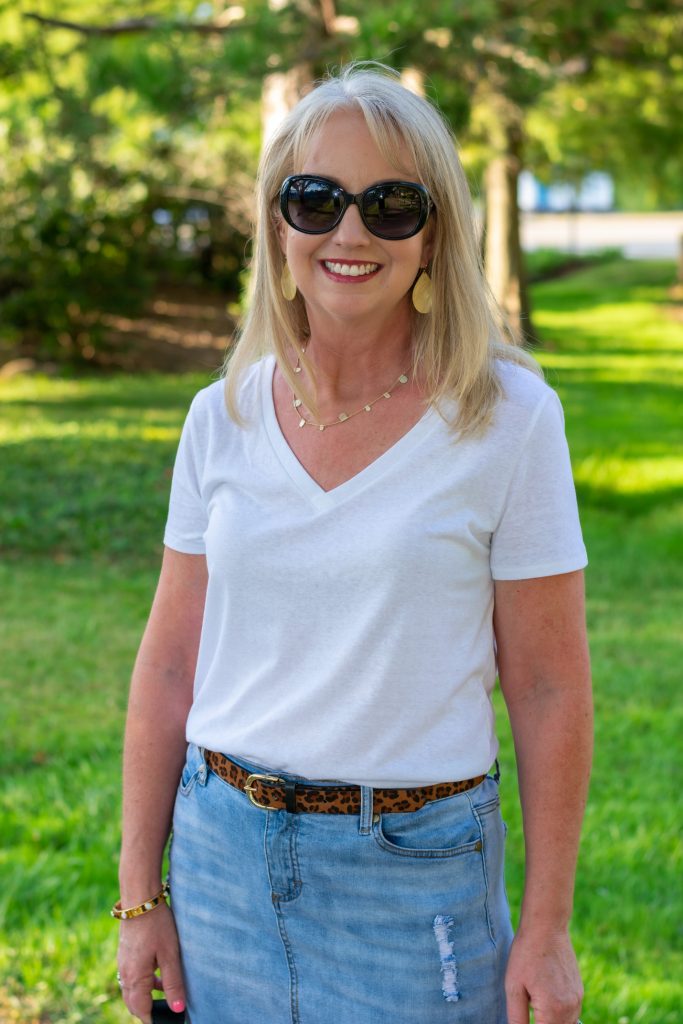 Transition into Fall with a White Tee and Denim Skirt