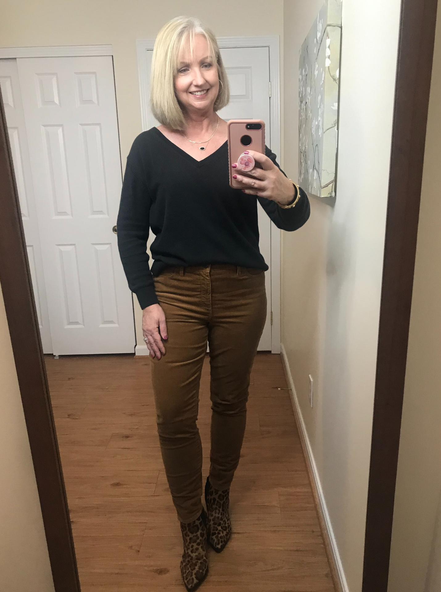 brown cords & black cotton sweater for an easy fall look