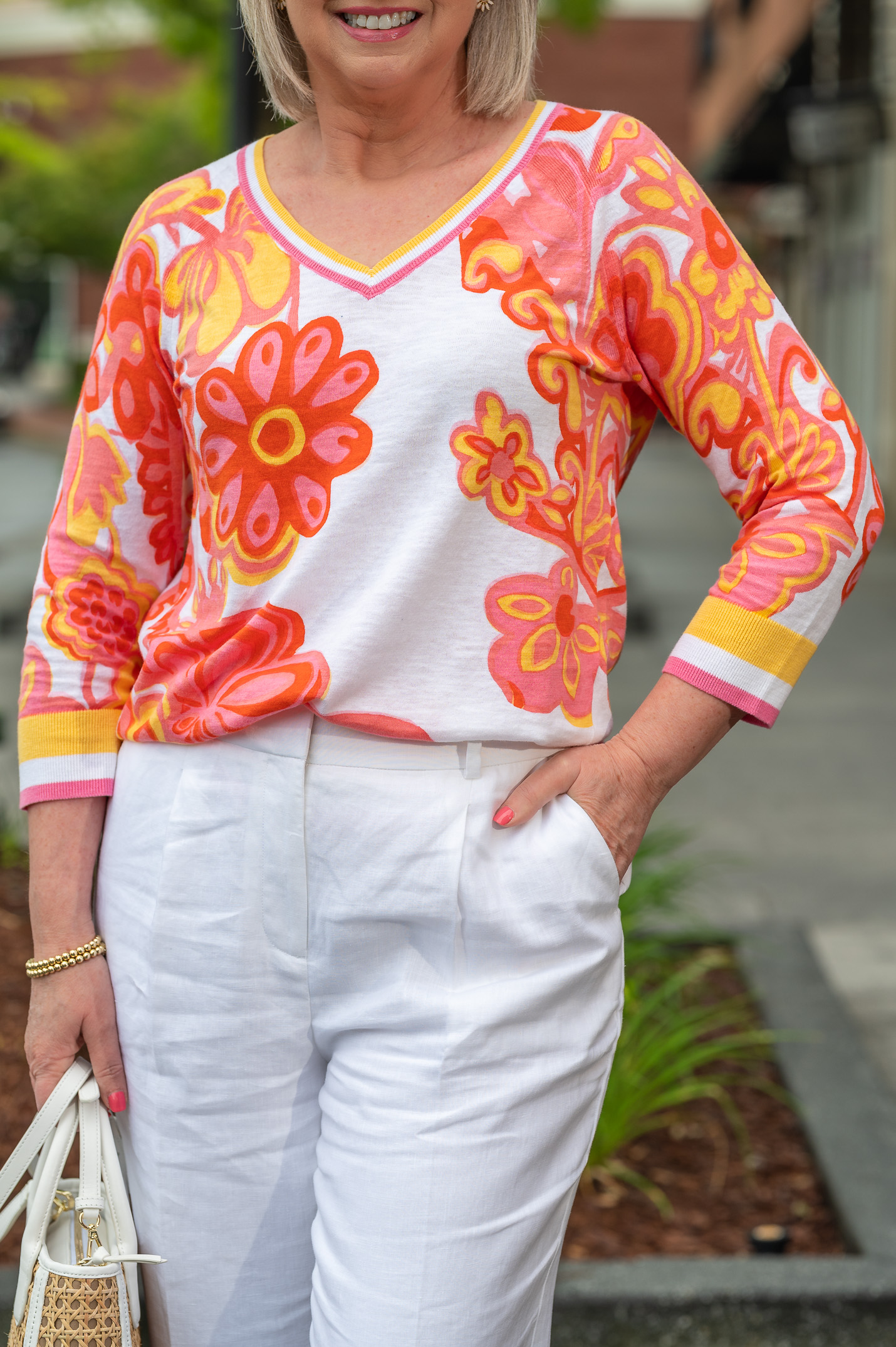 I topped the linen pants with the groovy floral print pullover