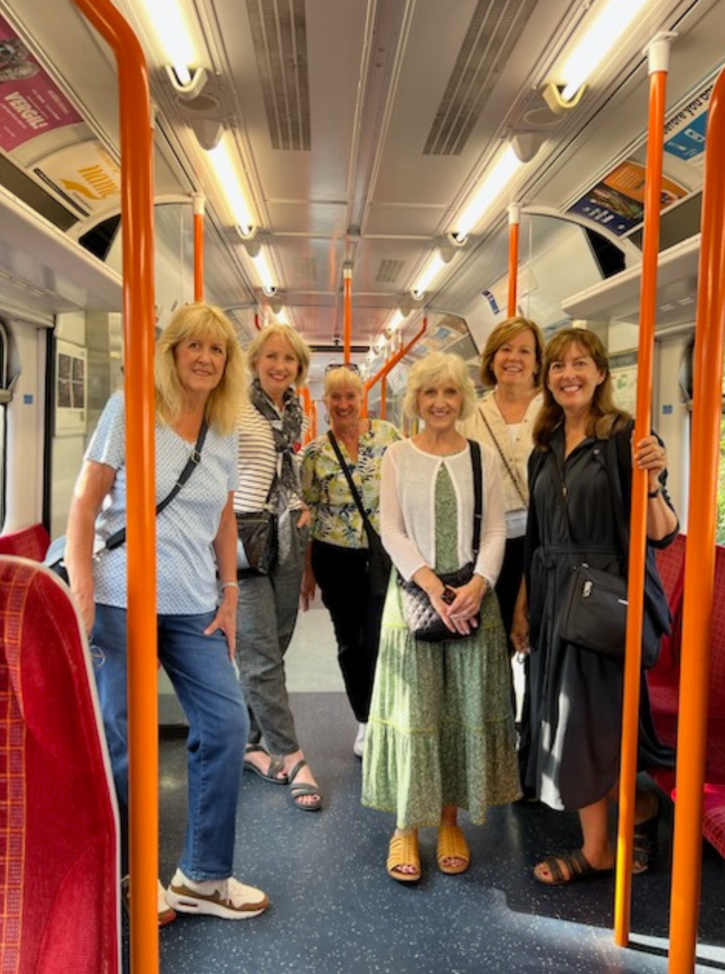 Most of our group on the overground train to London.